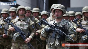 Грузинские бойцы с нашивками Сил реагирования НАТО, 26 мая, Тбилиси. Фотография — МО Грузии.