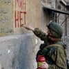«Ական չկա». ռուսաստանցի ականազերծող զինծառայողի գրառումը Հալեպի շենքերից մեկի պատին